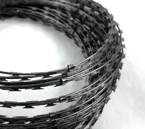 Close-up of a roll of concertina razor coil